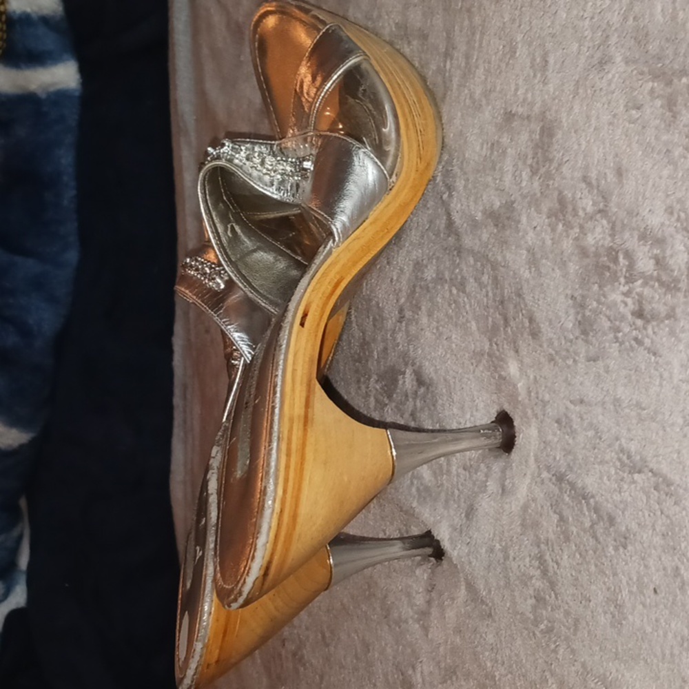 Used silver wood sandals